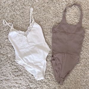 Bundle of tank bodysuits.